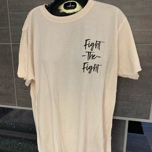 NWT “Fight the Fight” cream T-shirt